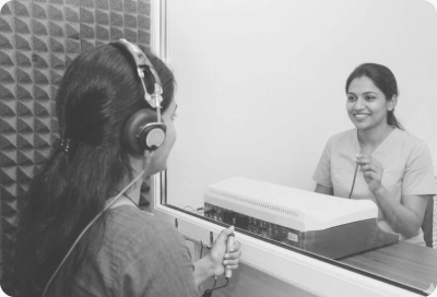 Hearing assessment with headphones in a clinical setting