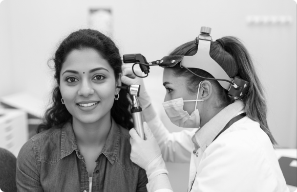 Audiologist performing a hearing test